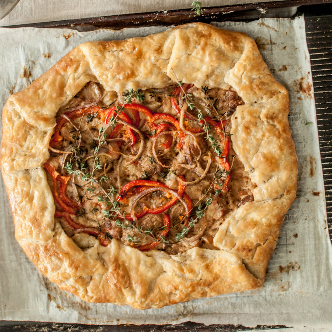 A Recipe for a Rustic Galette with a Creamy savory chicken filling! It's a wonderful alternative to the classic Chicken Pot Pie. It's surprisingly easy to make, and the fresh herbs give it such a full flavor! The all butter crust is a wonderful farmhouse staple of my kitchen, too!