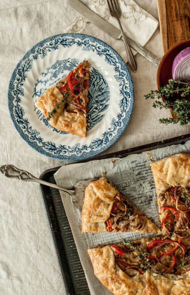 A Recipe for a Rustic Galette with a Creamy savory chicken filling! It's a wonderful alternative to the classic Chicken Pot Pie.  It's surprisingly easy to make, and the fresh herbs give it such a full flavor!  The all butter crust is a wonderful farmhouse staple of my kitchen, too!