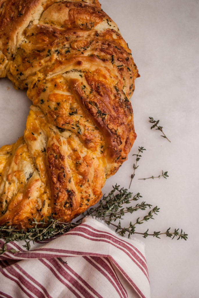 Easy Bread Recipe. Instructions and tutorial for this Herb & Cheddar Wreath. Perfect for Thanksgiving bread, Christmas bread, Holiday Baking, or any occasion! Cute Printable Recipe, too!